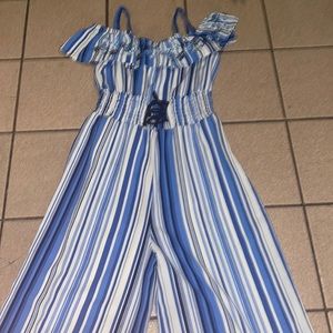Bright blue, white, and black designed romper for any kids with a bold style!